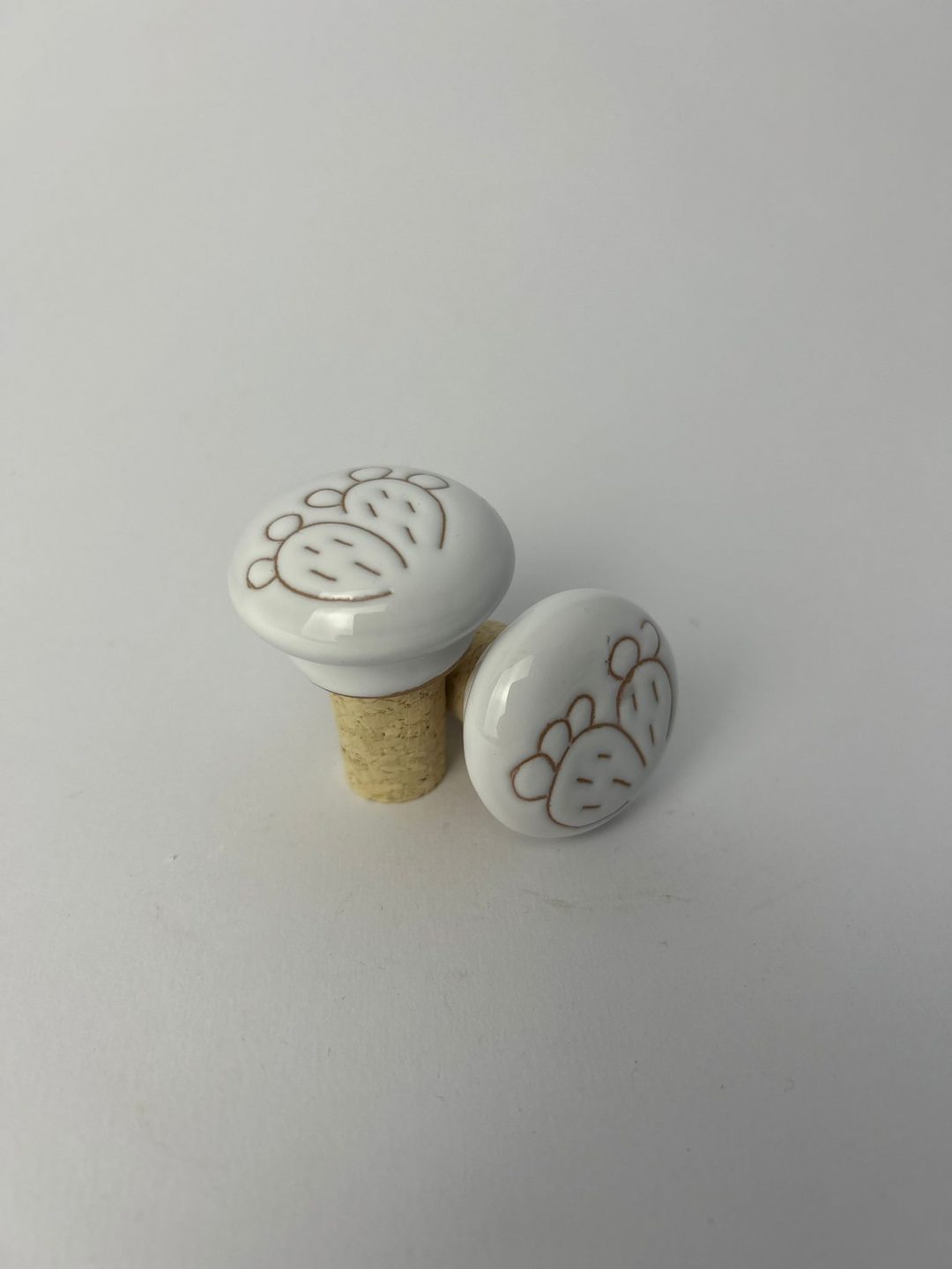 TAPPI PER BOTTIGLIE IN CERAMICA CON PALETTE