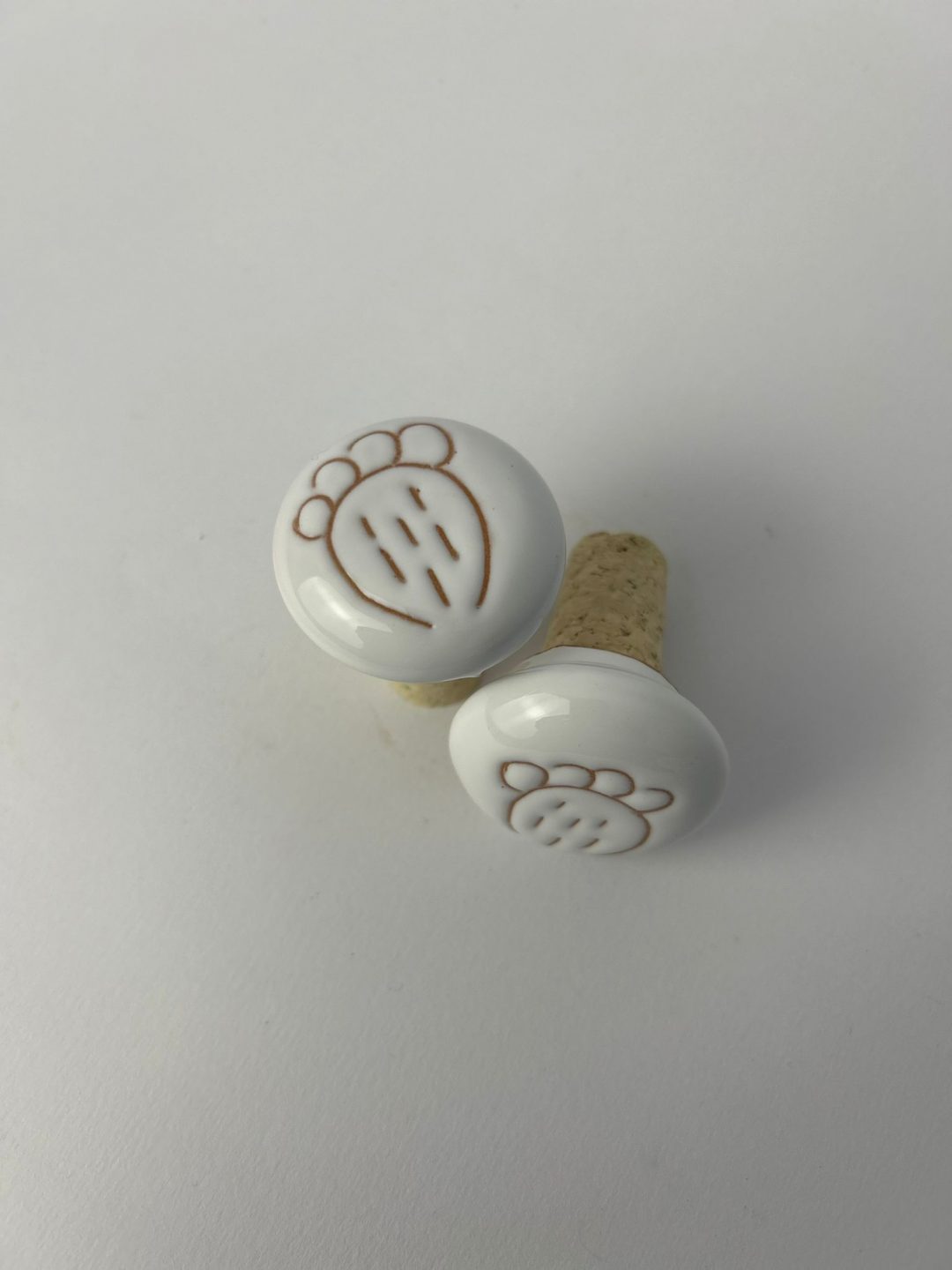 TAPPI PER BOTTIGLIE IN CERAMICA INCISA